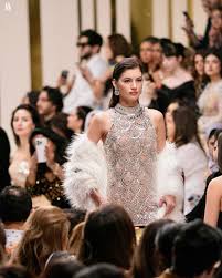 Professional Dubai fashion photoshoot with model posing in creative outdoor setting